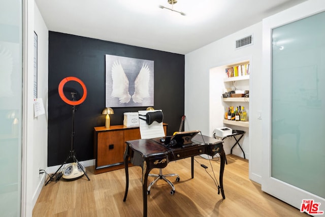 office area featuring light hardwood / wood-style floors