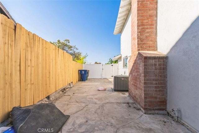 view of home's exterior featuring central AC and a patio area