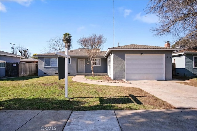 single story home featuring a garage and a front lawn