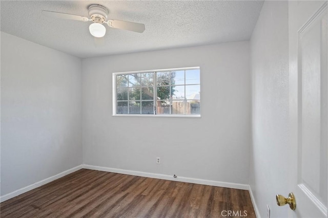 unfurnished room featuring dark hardwood / wood-style floors and ceiling fan