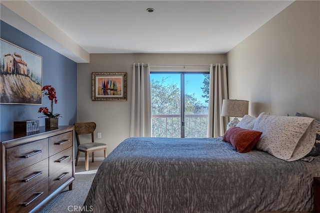 bedroom featuring dark carpet