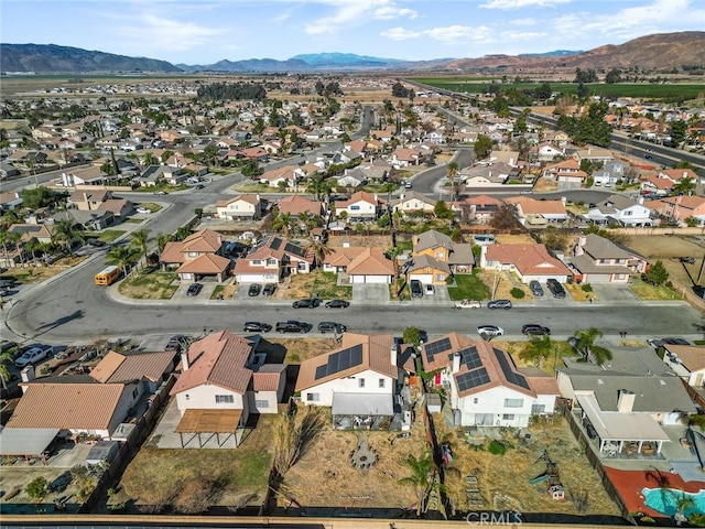 drone / aerial view with a residential view and a mountain view