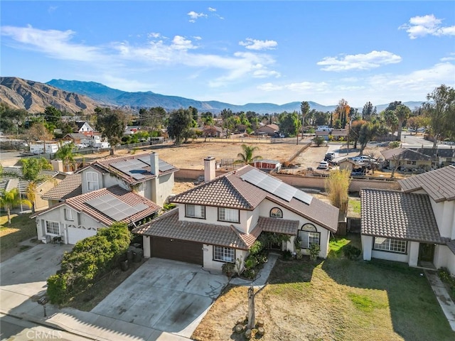 birds eye view of property featuring a residential view and a mountain view