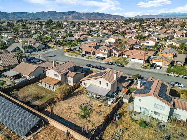 drone / aerial view with a residential view and a mountain view