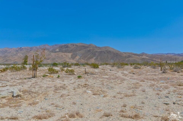 mountain view featuring a rural view