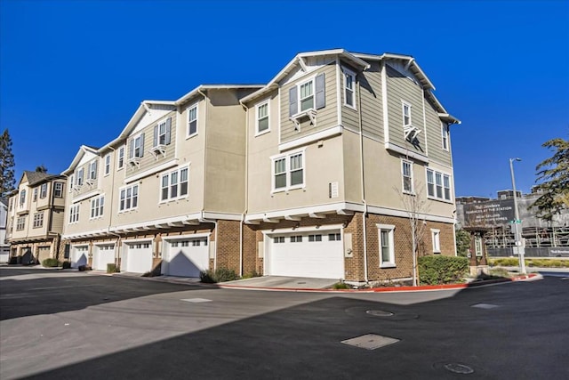 view of building exterior with a garage