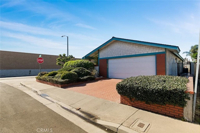 view of front of property featuring a garage