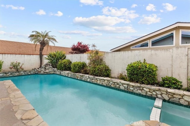 3521 Fern Cir, Seal Beach, CA 90740 - view of pool featuring fence and a pool with connected hot tub