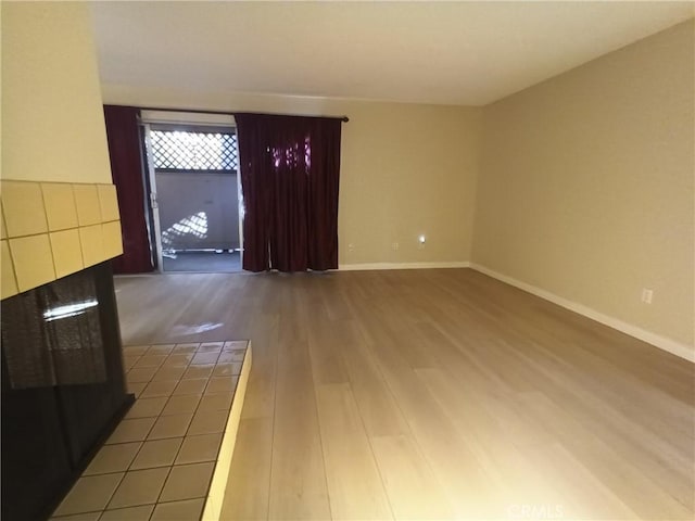 empty room featuring wood-type flooring