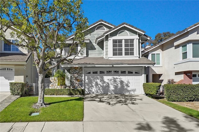 view of front property with central AC and a garage