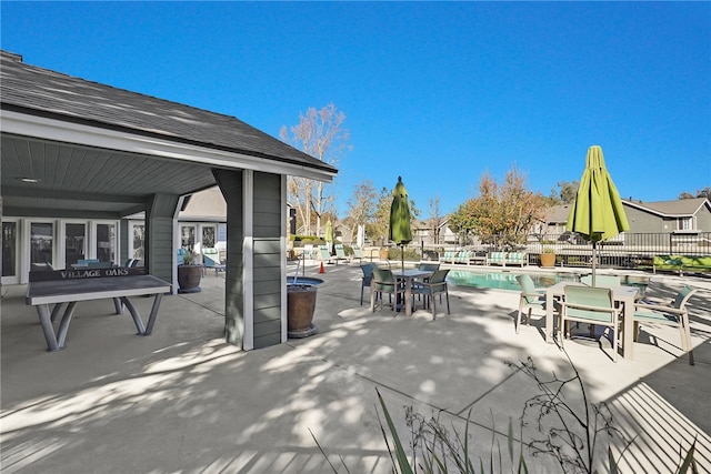 view of patio featuring a fenced in pool