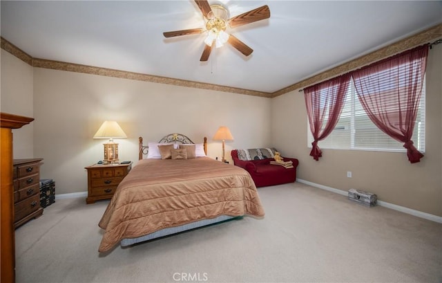 bedroom with light colored carpet and ceiling fan