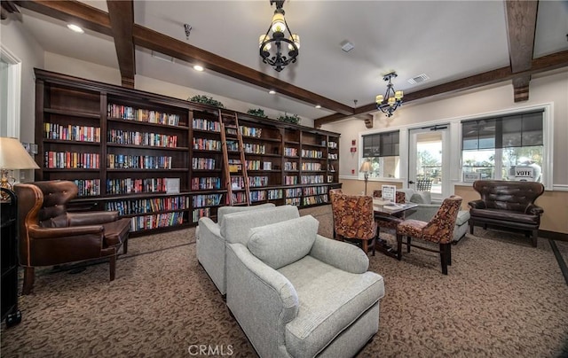 living area with beamed ceiling and an inviting chandelier