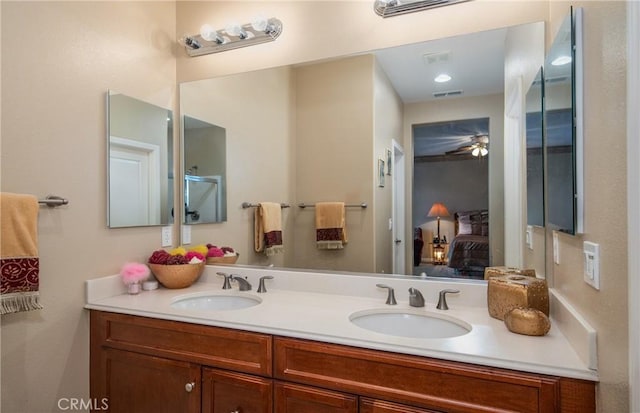 bathroom with vanity and ceiling fan