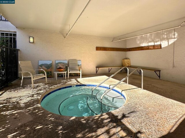 view of pool featuring an indoor in ground hot tub