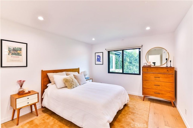 bedroom featuring light hardwood / wood-style flooring