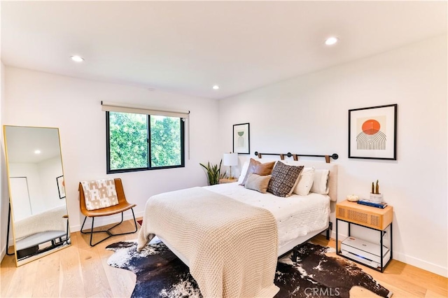 bedroom featuring light hardwood / wood-style flooring