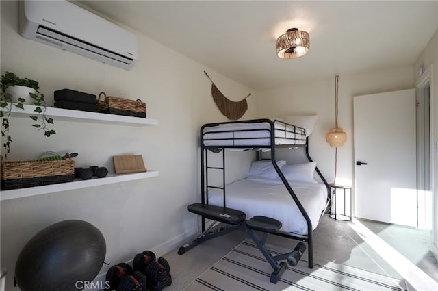 bedroom featuring a wall mounted air conditioner