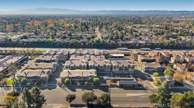 drone / aerial view featuring a mountain view