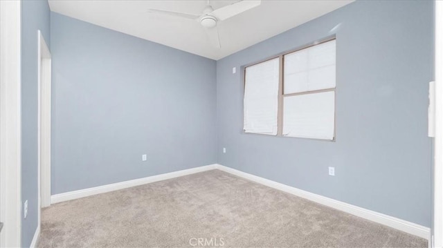 unfurnished room with light carpet and ceiling fan