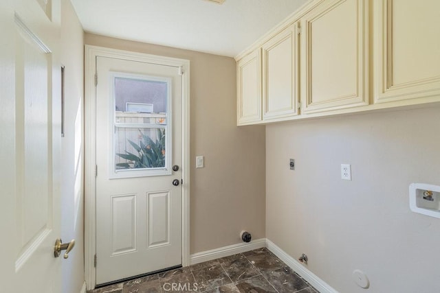 clothes washing area featuring washer hookup, cabinets, hookup for a gas dryer, and electric dryer hookup