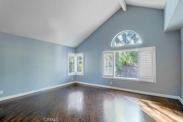 empty room with beam ceiling, high vaulted ceiling, and wood-type flooring