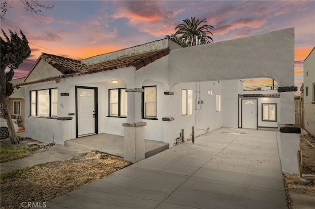 view of front of property with a patio area