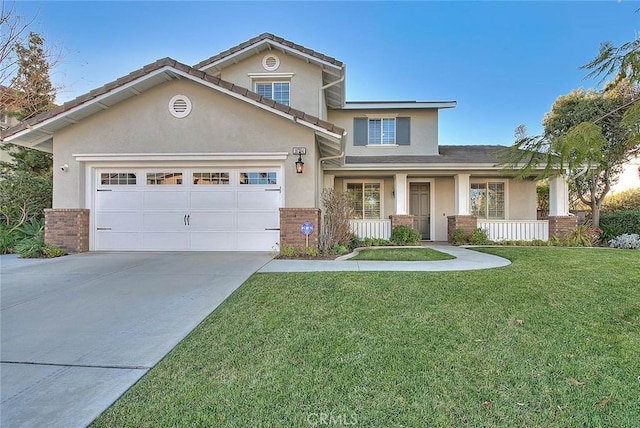 view of front of home featuring covered porch, a front lawn, and a garage