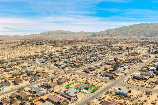 bird's eye view with a mountain view