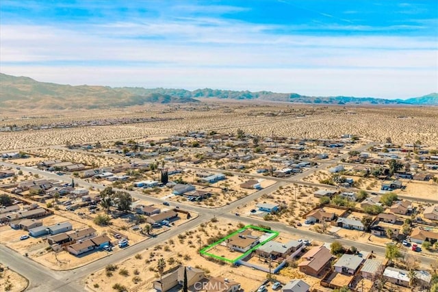 bird's eye view with a mountain view