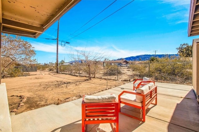 view of patio featuring a mountain view