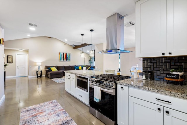 kitchen with appliances with stainless steel finishes, white cabinets, island exhaust hood, and light stone counters