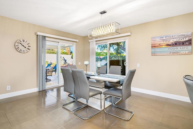 dining area with tile patterned floors and plenty of natural light