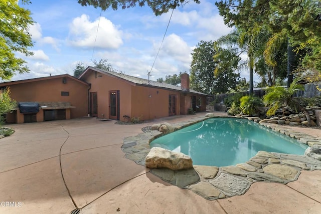 view of pool with a patio area