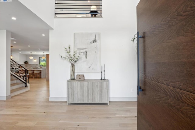 hallway featuring light hardwood / wood-style flooring