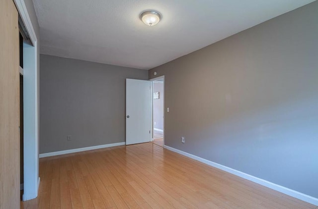 unfurnished bedroom featuring light hardwood / wood-style flooring