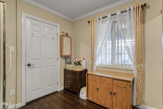 living area with dark hardwood / wood-style flooring and ornamental molding