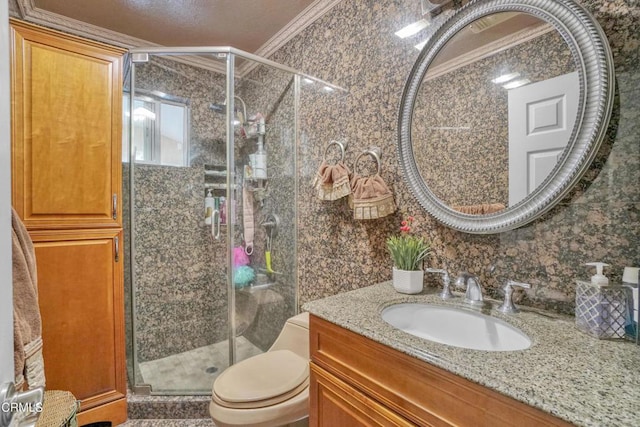 bathroom featuring toilet, walk in shower, vanity, and ornamental molding