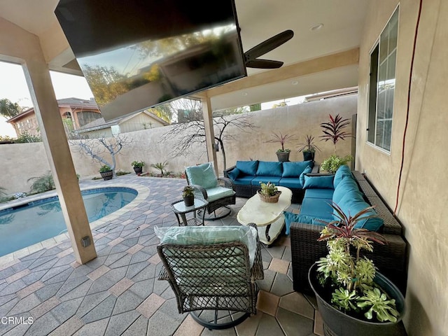 view of patio / terrace featuring a fenced in pool, ceiling fan, and outdoor lounge area