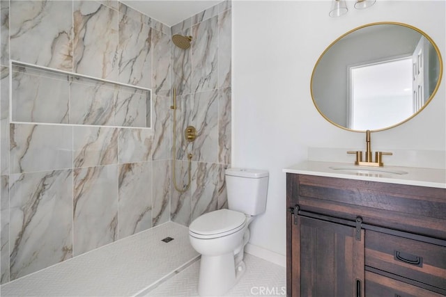 full bathroom featuring a marble finish shower, toilet, and vanity