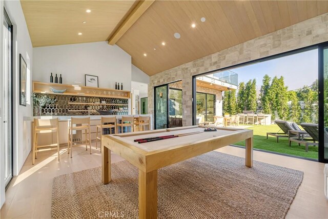 recreation room with billiards, a wealth of natural light, and beamed ceiling