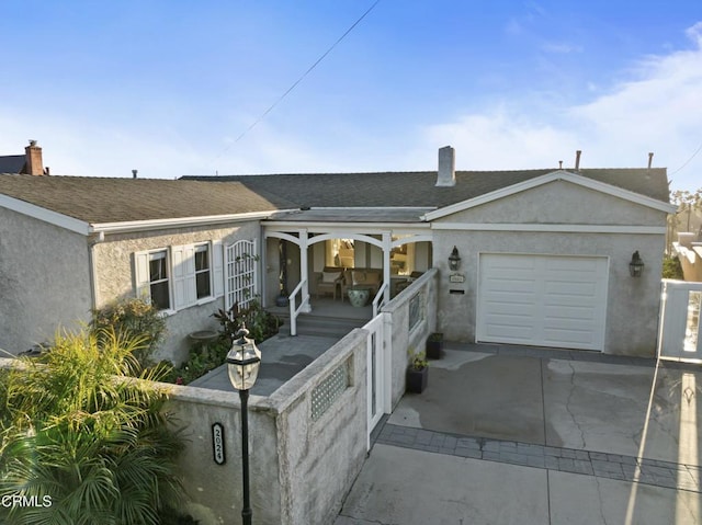 ranch-style home with a garage