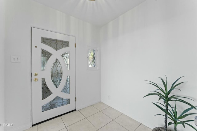 entrance foyer featuring light tile patterned floors