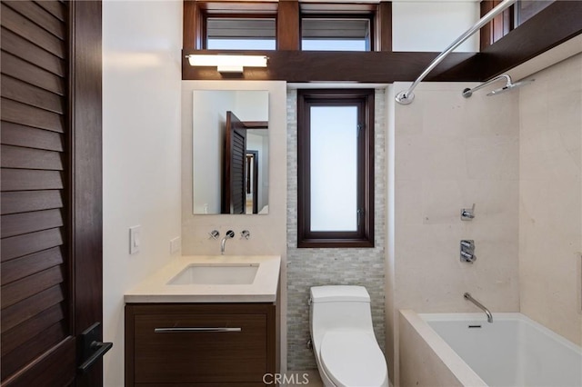 full bath featuring shower / washtub combination, vanity, and toilet