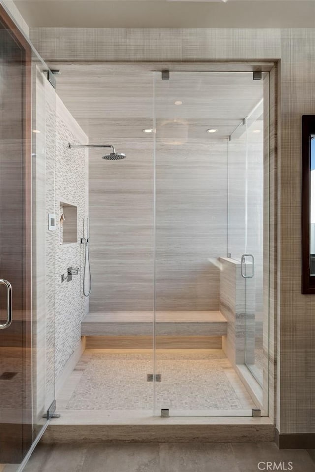 bathroom with a shower stall