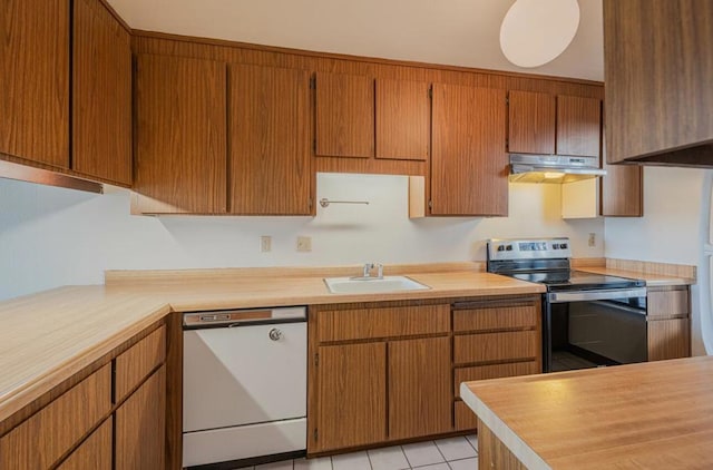 kitchen featuring extractor fan, dishwasher, light tile patterned floors, stainless steel electric range, and sink