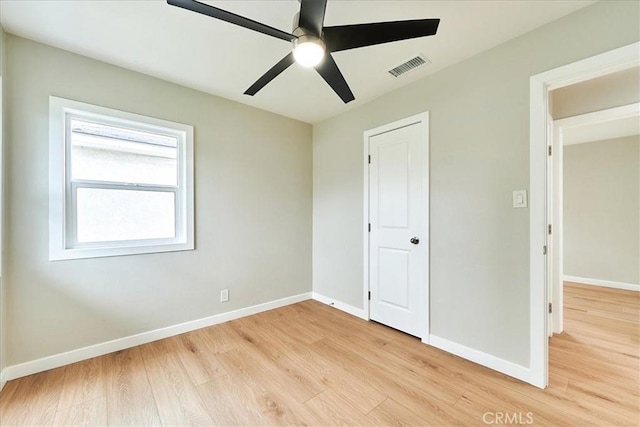 unfurnished bedroom featuring ceiling fan and light hardwood / wood-style flooring