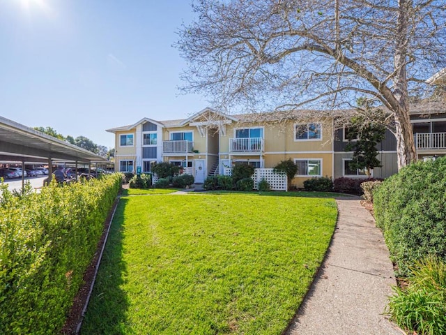 view of front of house with a front lawn