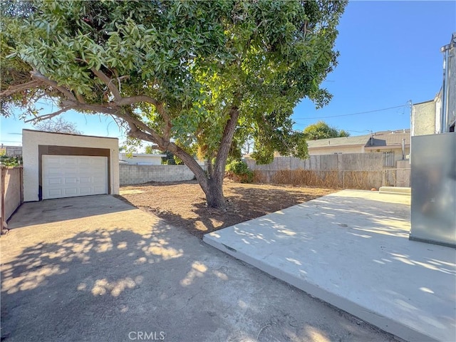 view of yard featuring a garage