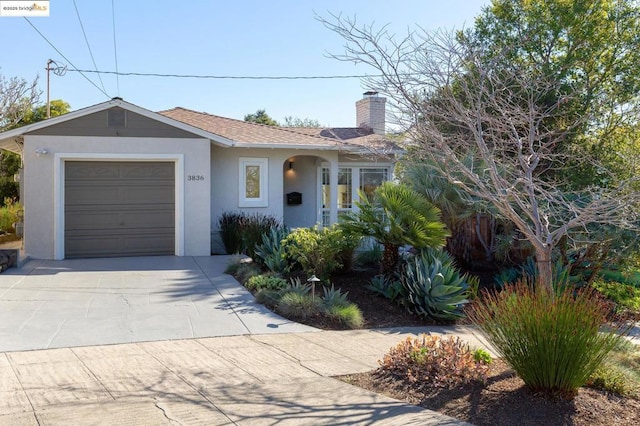 ranch-style home with a garage